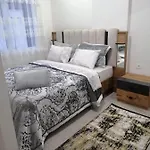アパート Alper Bey Homes *